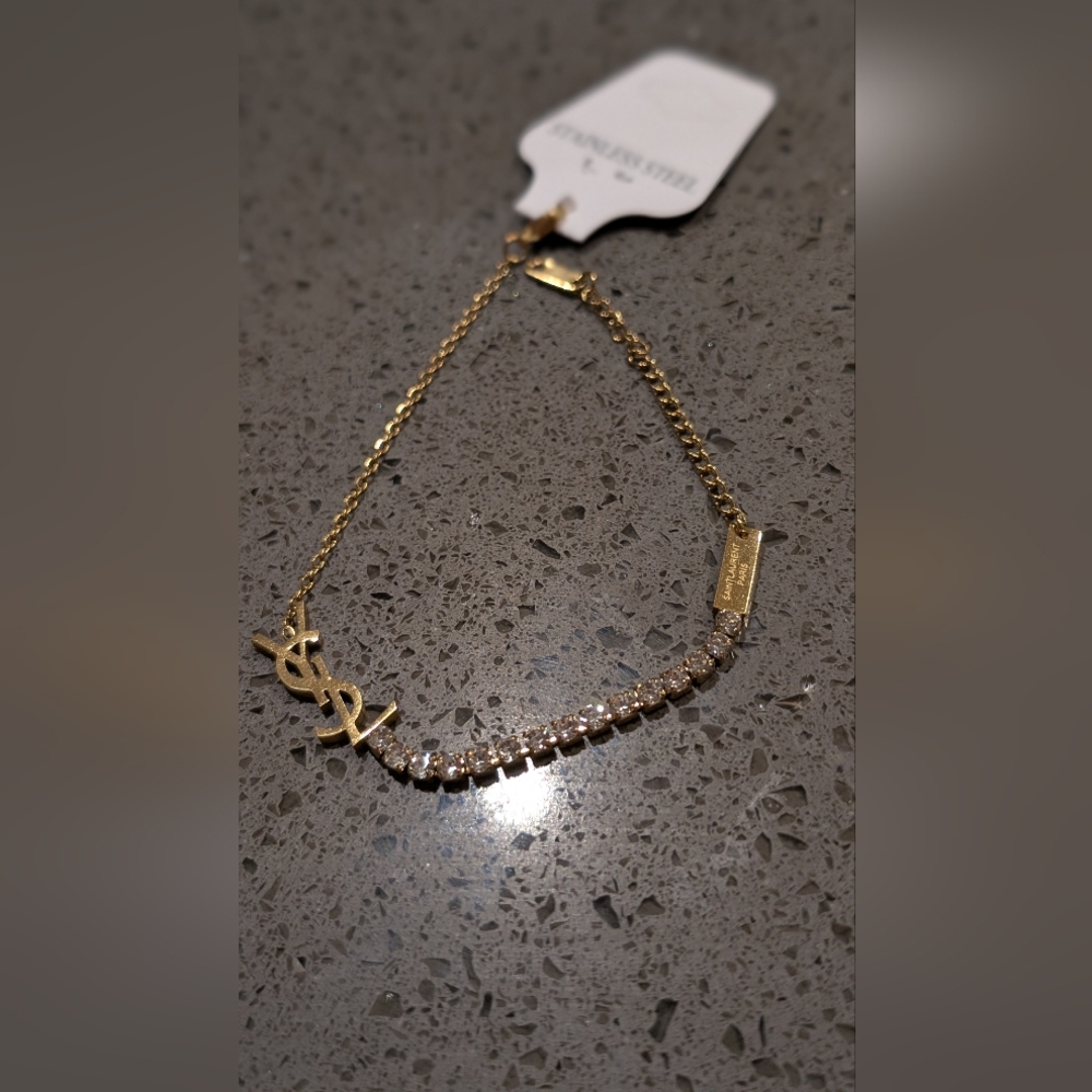 Gold Stainless Steel Yves Saint Laurent Women's Bracelet - Picture 5 of 12